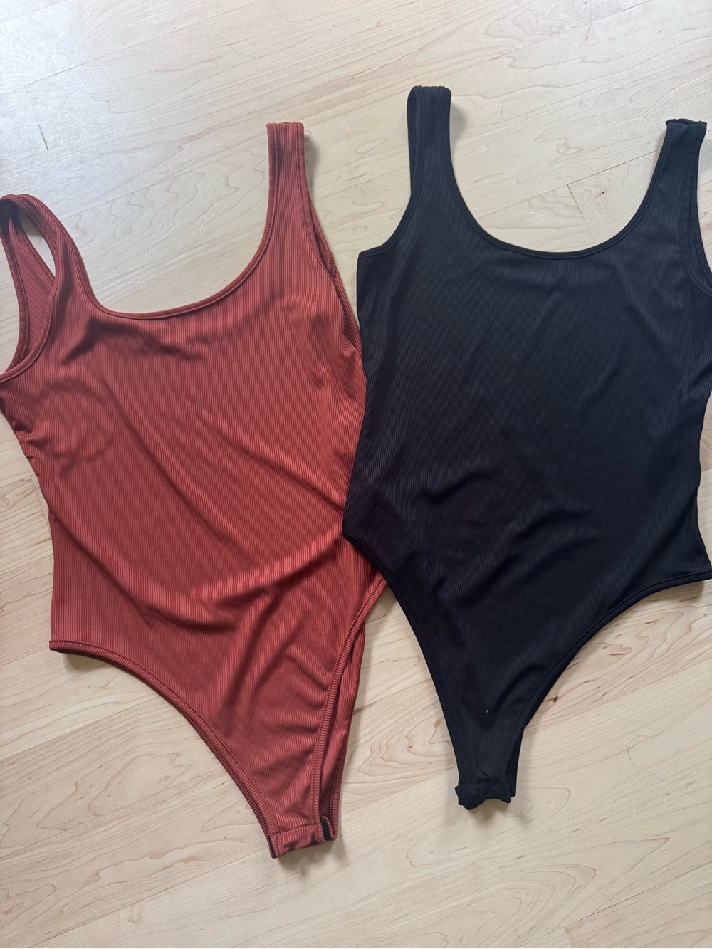 SHEIN Kids One Piece Bodysuits in Rust and Black
